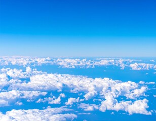 High-altitude view of clouds and a vibrant blue sky