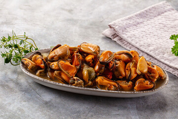 Peeled mussels heap in the bowl