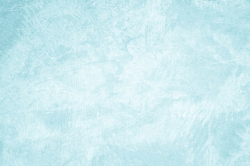 Pastel blue and white concrete stone texture for background in summer wallpaper. Cement and sand wall of tone vintage. Concrete abstract wall of light cyan color, cement texture mint green for design.