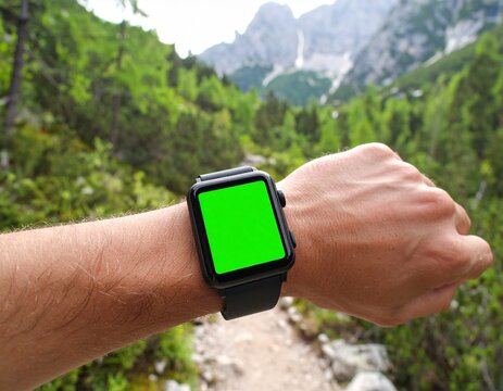 Smartwatch Green Screen on Wrist in Nature Hiking Trails Exploration