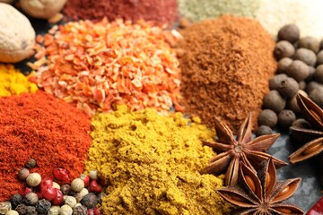 Many different spices on table, closeup view