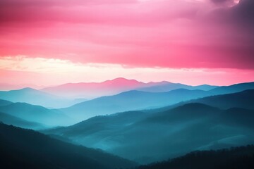 Obraz premium Pink Sky Over Blue Mountain Ridges: A Serene and Majestic Landscape Photography Scene