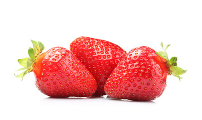Three fresh ripe strawberries isolated on white