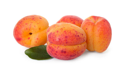 Fresh ripe apricots and green leaf isolated on white