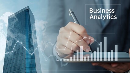 Businessman analyzing business analytics data on a tablet with futuristic city background