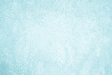 Pastel blue and white concrete stone texture for background in summer wallpaper. Cement and sand wall of tone vintage. Concrete abstract wall of light cyan color, cement texture mint green for design.