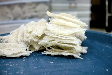 Premium edible bird's nests, meticulously cleaned and individually wrapped, reflecting a commitment to quality and purity.