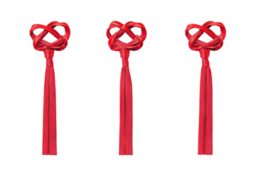 Three red chinese knots with tassels isolated on transparent background. Set of chinese art traditional knot tying with vibrant red decorative ribbons isolated on white background.