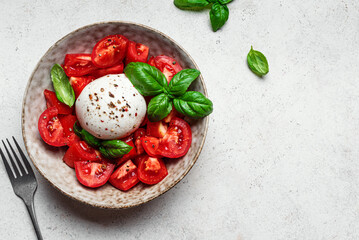 Tomato salad with stracciatella cheese