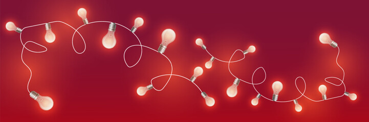 Garland of glowing light bulbs. On a red background