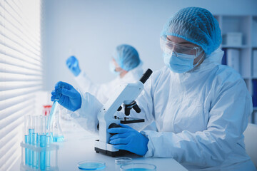 Medical analysis. Scientists working with samples in laboratory, selective focus