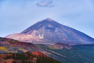 Teide volcano above volcanic slopes