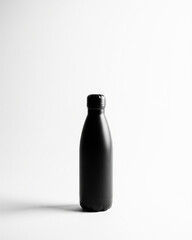 Sleek Black Water Bottle: A minimalist studio shot showcases a sophisticated black water bottle, exemplifying form meets function.