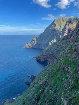 Natural Park Coastline in Tenerife &ndash; Stunning View of Lush Green Cliffs Dropping into the Deep Blue Ocean, Capturing the Island&rsquo;s Wild Beauty Between Land and Sea in the Canary Islands