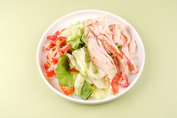 Cherry tomato and turkey salad in white bowl for weight loss, nutrition, and food blog content