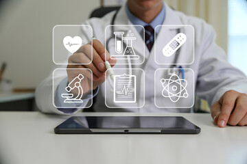 Doctor interacting with medical icons on tablet screen healthcare technology