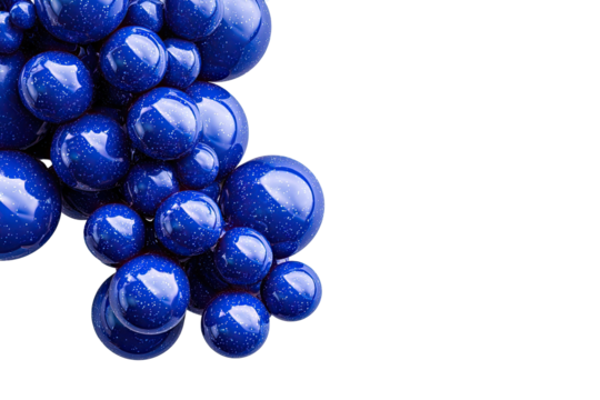 Cluster of glossy, deep blue orbs against black