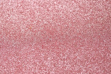 Fototapeta premium Beautiful pink glitter sparks texture as background with shallow depth of field