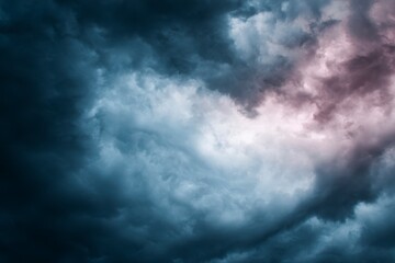 Fototapeta premium Dramatic storm clouds, dark blues and purples