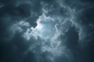 Dark clouds swirling, sunlit center