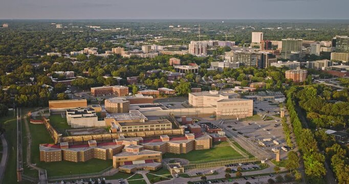 Raleigh North Carolina Aerial v24 flyover Dix Park, capturing Central Prison, views of Boylan Heights neighborhood and downtown cityscape at sunset - Shot with Inspire 3 8k - Sept 30th 2023