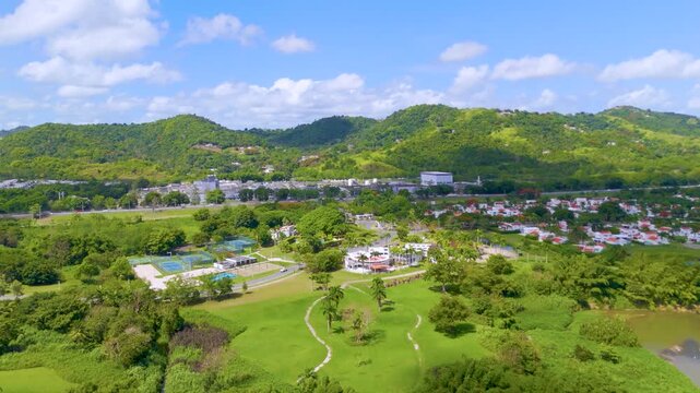 Drone footage of a Golf Course in Gurabo, Puerto Rico. Captures lush fairways, tropical scenery, and mountain views&mdash;ideal for travel, real estate, sports, and outdoor lifestyle content.