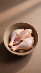 Raw Chicken Drumsticks in Bowl