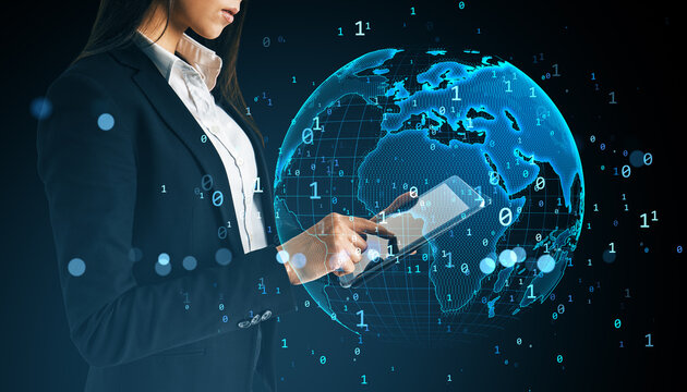 Businesswoman using digital tablet with holographic global map and binary code background representing global data connectivity concept.