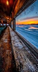 Wooden interior overlooks a winter sunrise