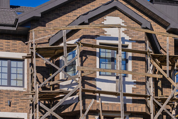 Construction of buildings, a multi-story building against the sky
