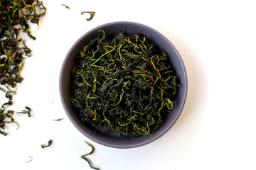 Fototapeta premium Dried mulberry leaves, commonly used for herbal tea and traditional remedies.