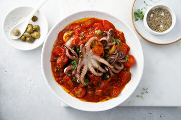 Octopus with tomato sauce and capers