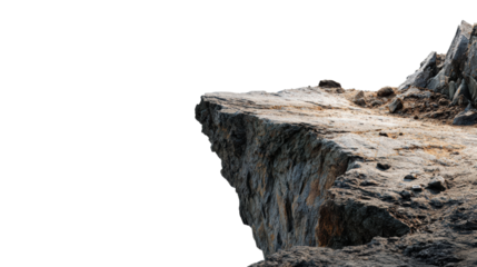A rugged rock formation with a textured surface, set against a stark black background, emphasizing its natural contours and ruggedness.