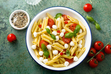 Pasta with mozzarella cheese and tomatoes