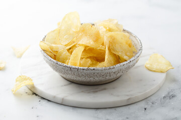 Homemade potato chips in a bowl