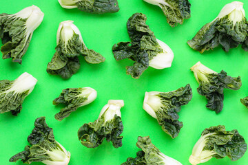 Fresh baby bok choy with crisp white green leaves.