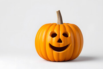 Carved Halloween pumpkin with cheerful expression on soft white surface. Perfect for party graphics, seasonal banners, or autumn product ads.