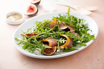 Arugula salad with smoked duck breast and fig