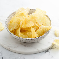 Homemade potato chips in a bowl