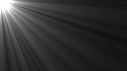 Bright white light rays radiating from upper left corner on black background
