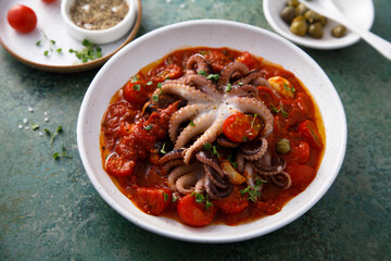 Octopus with tomato sauce and capers