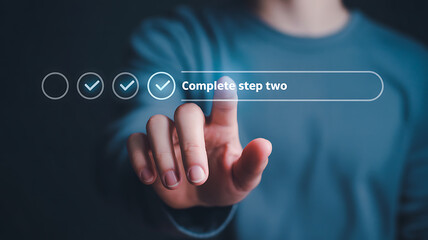 Person completing a checklist with digital interface
