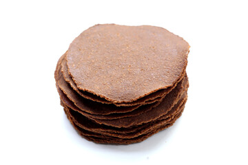 Fermented soybean discs, known as “Thua Nao,” a traditional Thai seasoning used to enhance flavor in Northern cuisine.
