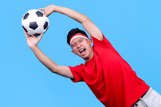 Excited Indonesian Supporter As Goalkeeper Dramatically Catching Soccer Ball While Shouting