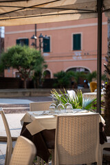 A table ready for consumption in a restaurant, Alghero