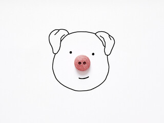 Drawing of a pig face with a pink button as a nose on white background