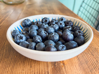 Side View of a Bowl Full of Fresh Blueberries