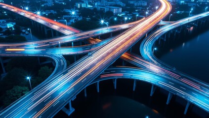 Motion blur from fast-moving cars on a dark city street, with trails of light illuminating the urban transportation network at night.