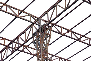 Blue sky frames a towering pylon, its steel wire fence and high-voltage power lines forming a critical part of the industrial electrical grid