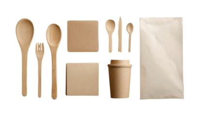 Overhead view of assorted eco-friendly disposable tableware.  Wooden spoons, forks, and knives arranged with brown paper plates, cups, and napkins.  Natural, sustainable, and compostable